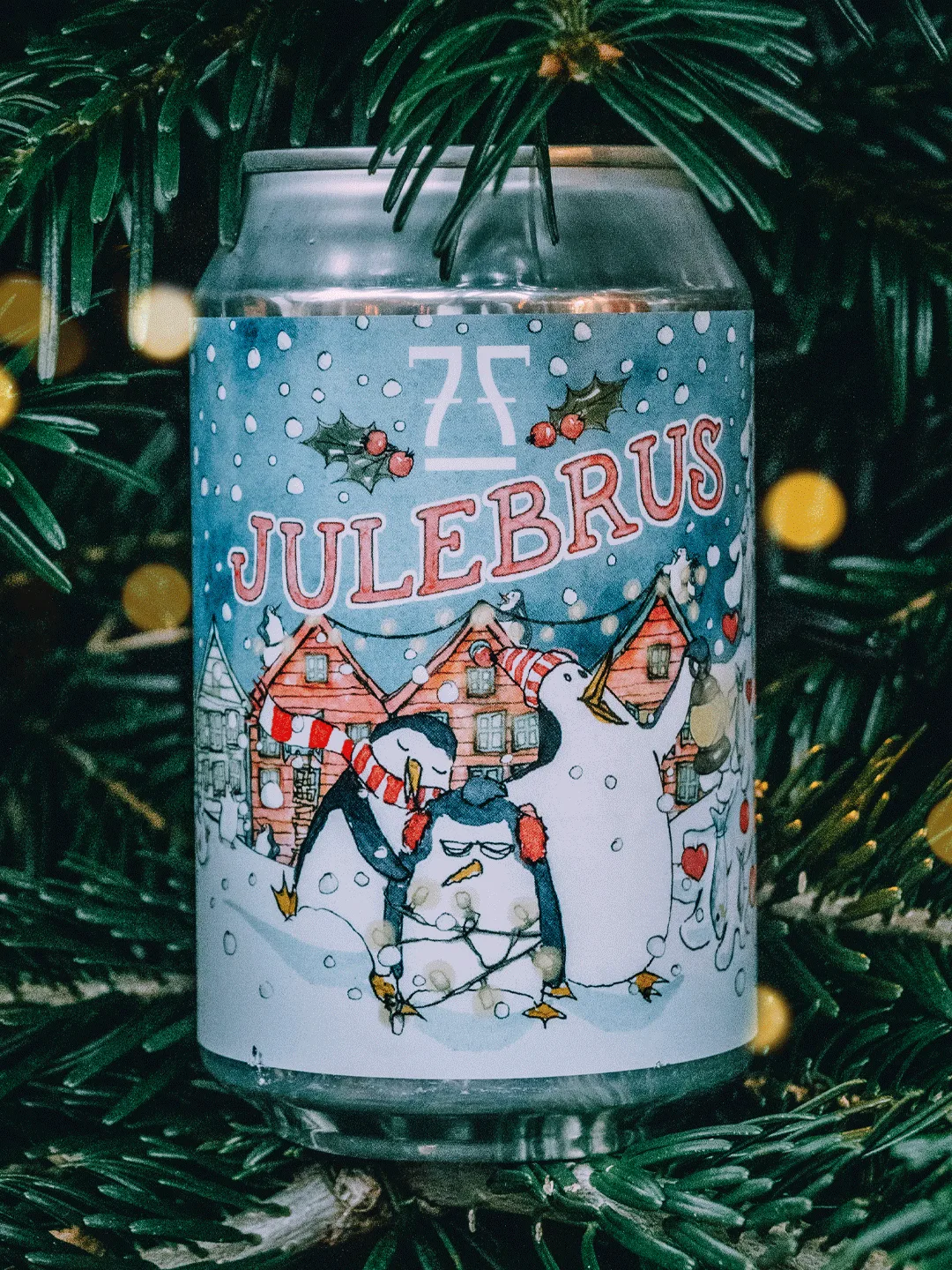 The 7 Fjell Julebrus can with red lettering and a snowy Bryggen in the background